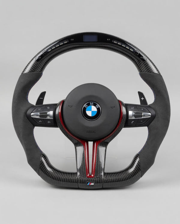 Volante M Performance G-Series — LED Carbono + Alcantara Gris